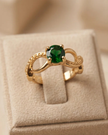 Gold Emerald Round Infinity Twist Ring