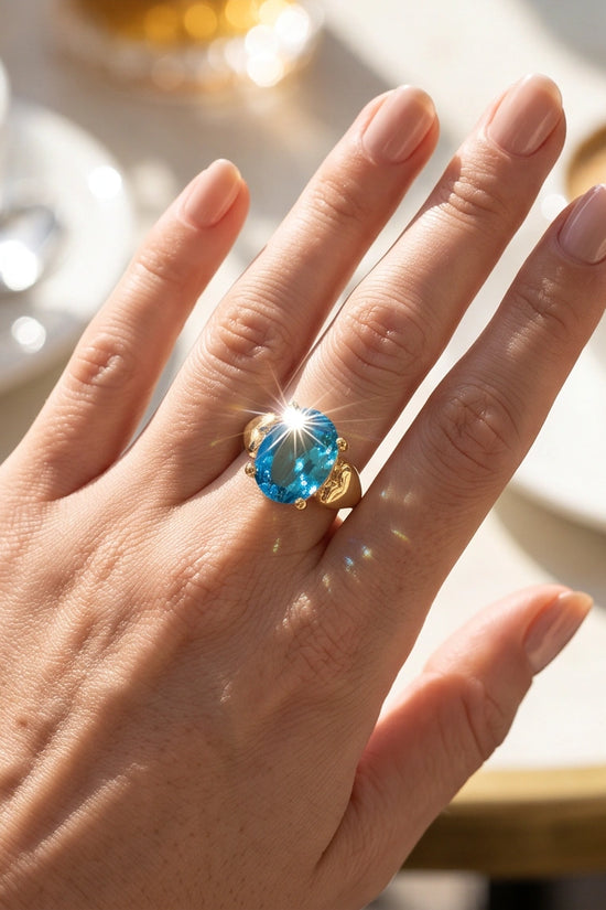 Gold Plated Sky Blue Topaz Oval Heart Accent Ring