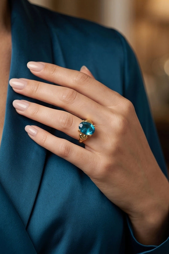 Gold Plated Sky Blue Topaz Oval Heart Accent Ring