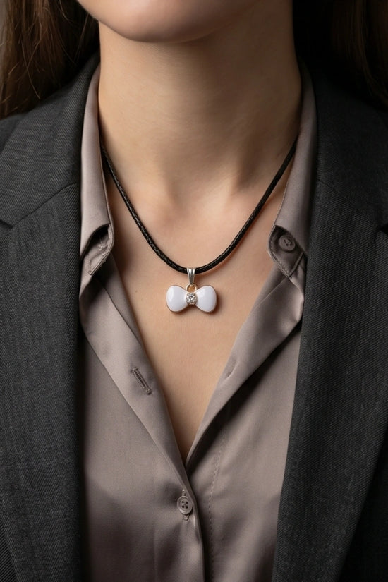 Gold and White Bow Tie Pendant Necklace