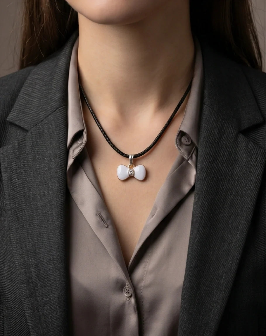 Gold and White Bow Tie Pendant Necklace