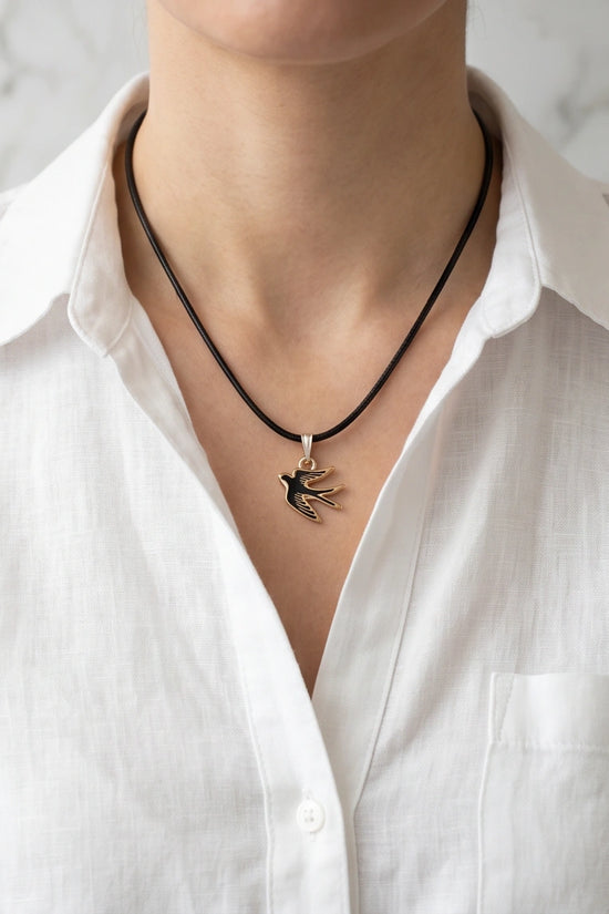 Gold and Black Soaring Swallow Necklace