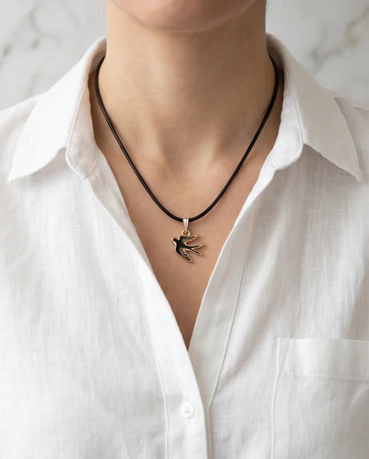 Gold and Black Soaring Swallow Necklace