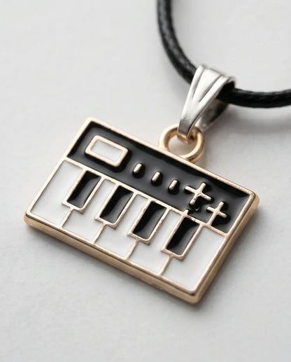 Gold and Black Synthesizer Keyboard Necklace