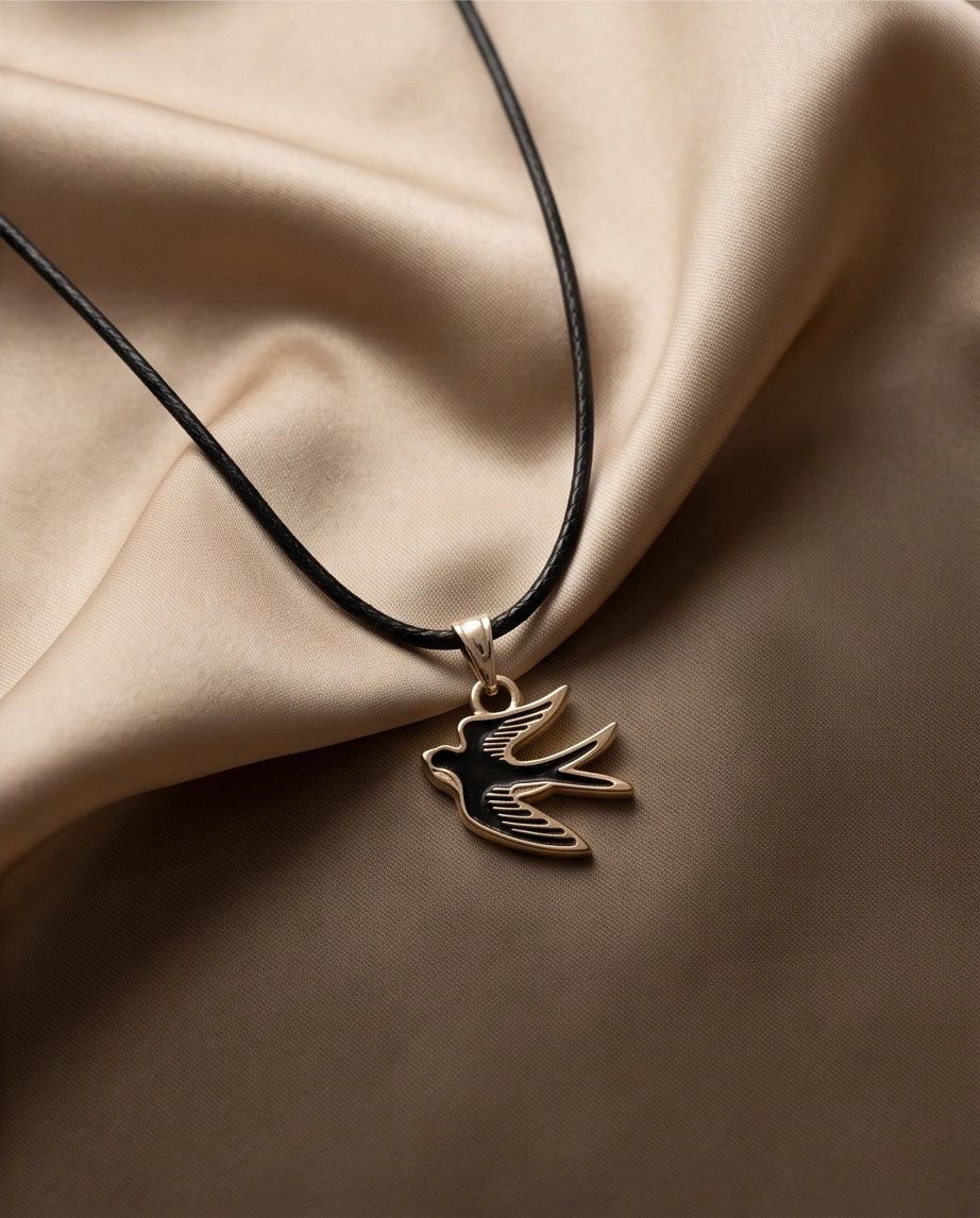 Gold and Black Soaring Swallow Necklace