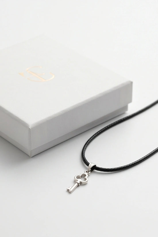 The Secret Keeper: Minimalist Silver Clover Key Pendant Necklace