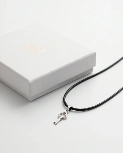 The Secret Keeper: Minimalist Silver Clover Key Pendant Necklace