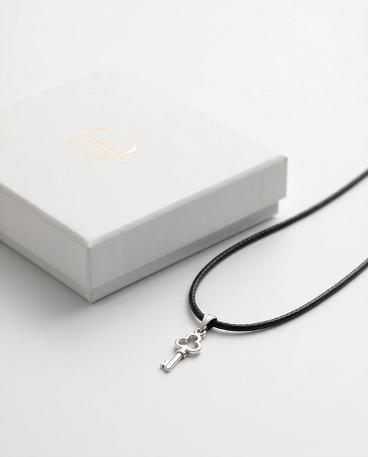 The Secret Keeper: Minimalist Silver Clover Key Pendant Necklace