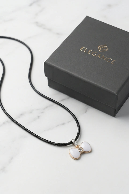 Gold and White Bow Tie Pendant Necklace