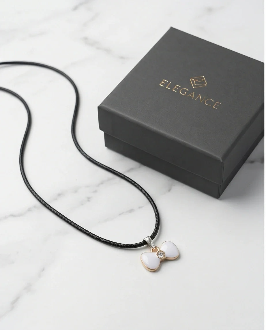 Gold and White Bow Tie Pendant Necklace