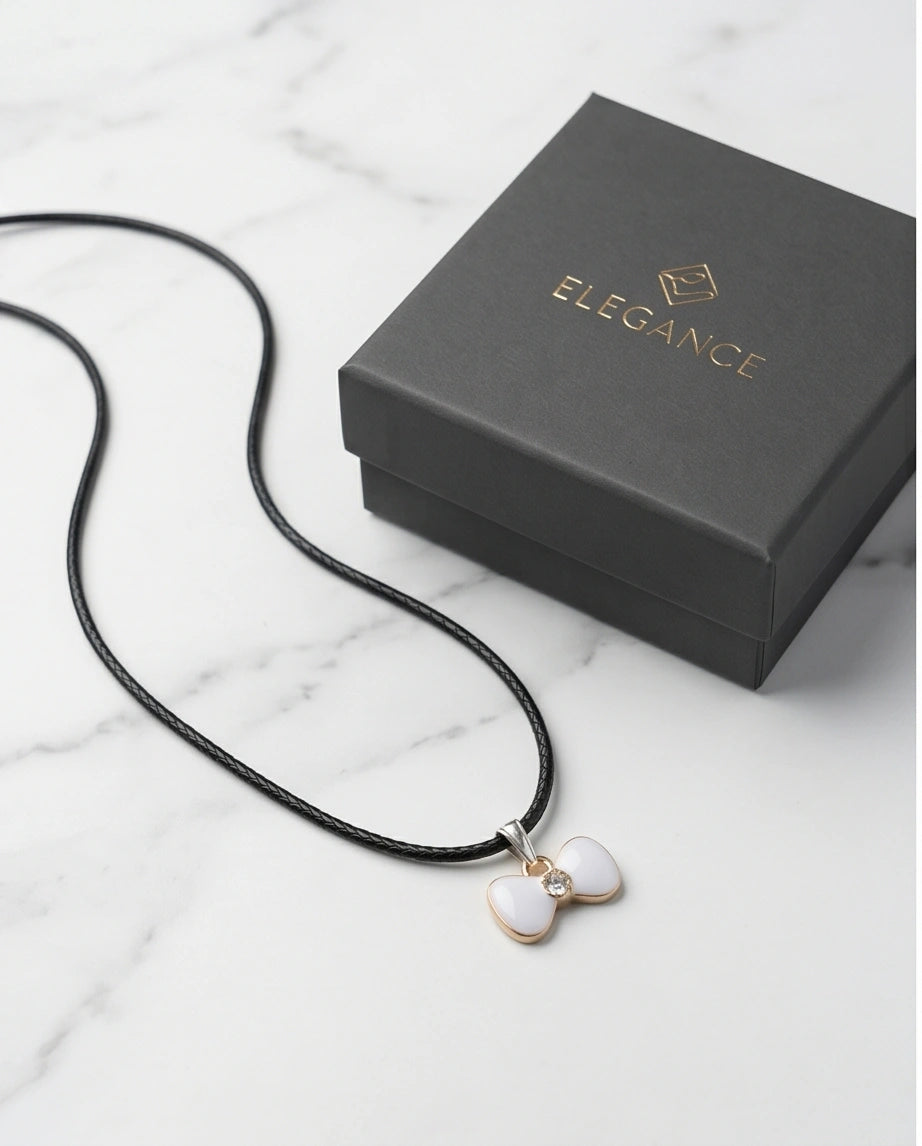 Gold and White Bow Tie Pendant Necklace