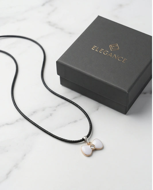 Gold and White Bow Tie Pendant Necklace