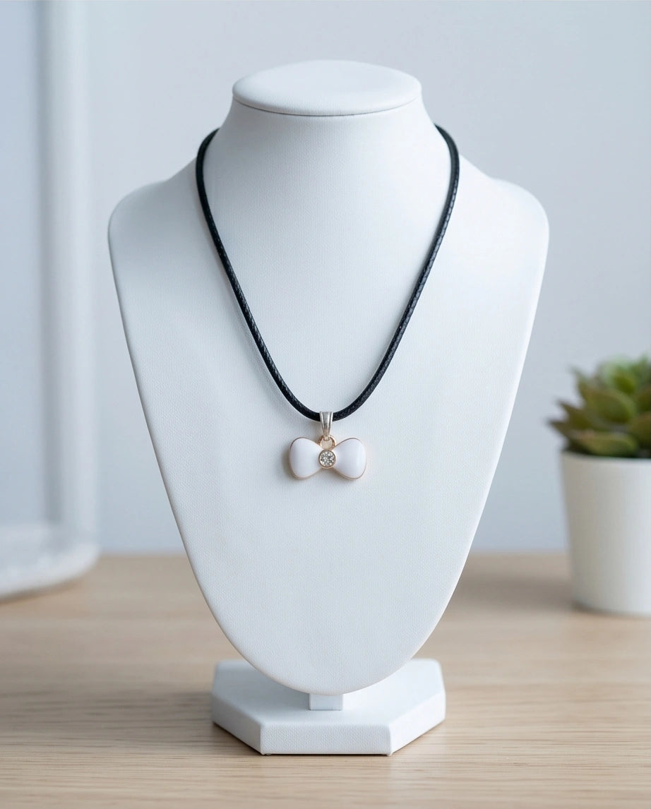 Gold and White Bow Tie Pendant Necklace
