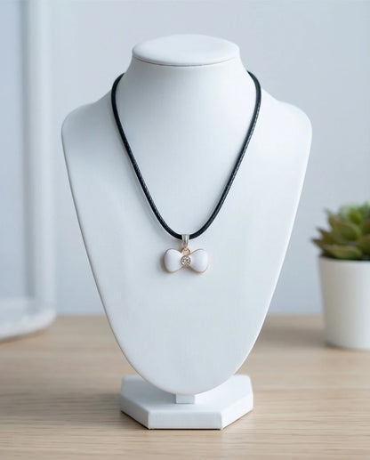 Gold and White Bow Tie Pendant Necklace