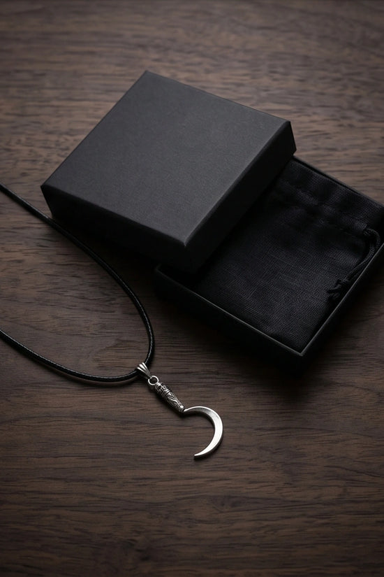 The Reaper's Crescent: Gothic Skull Sickle Pendant Necklace