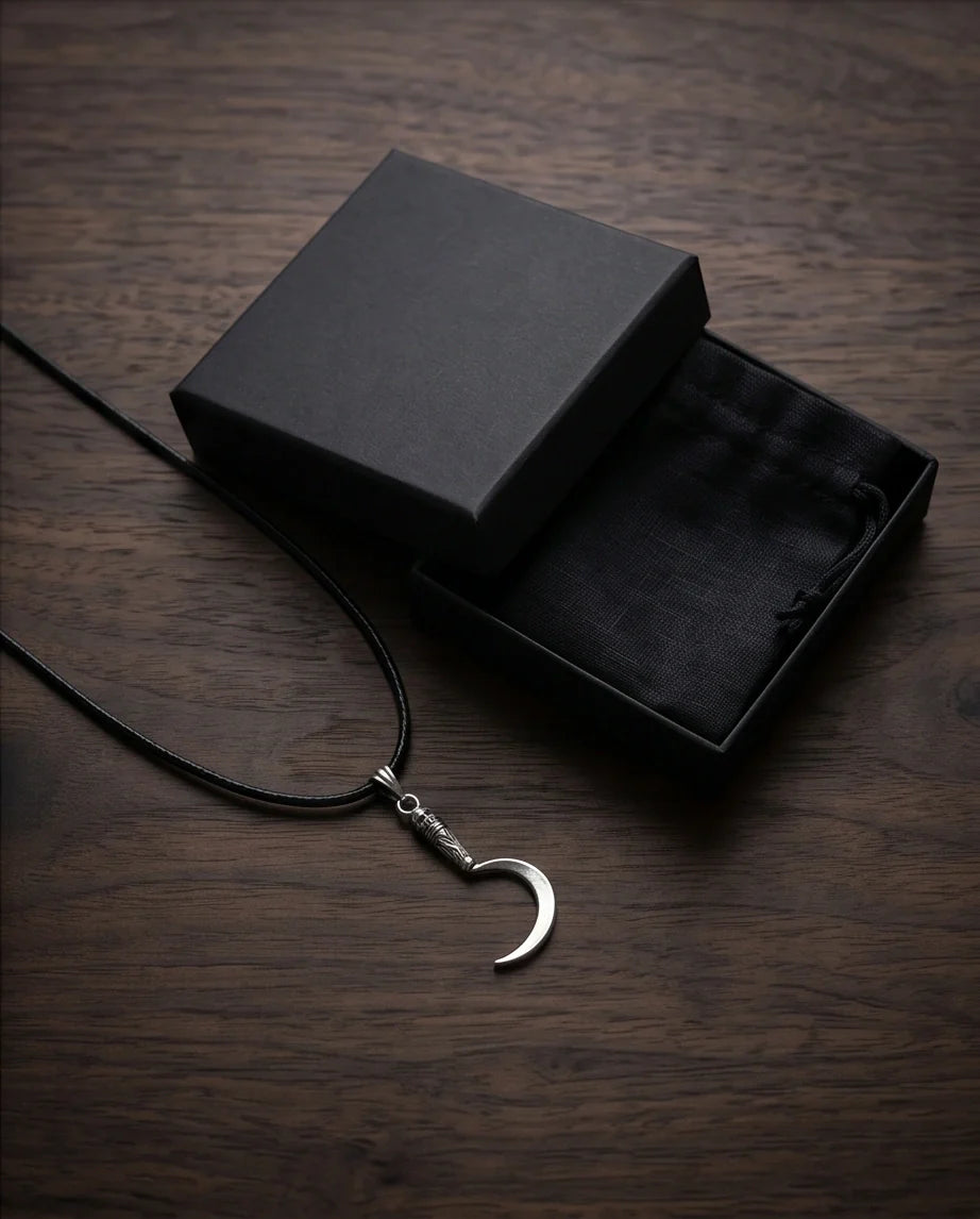 The Reaper's Crescent: Gothic Skull Sickle Pendant Necklace