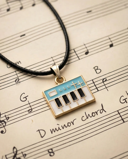Gold and Light Blue Synthesizer Keyboard Necklace
