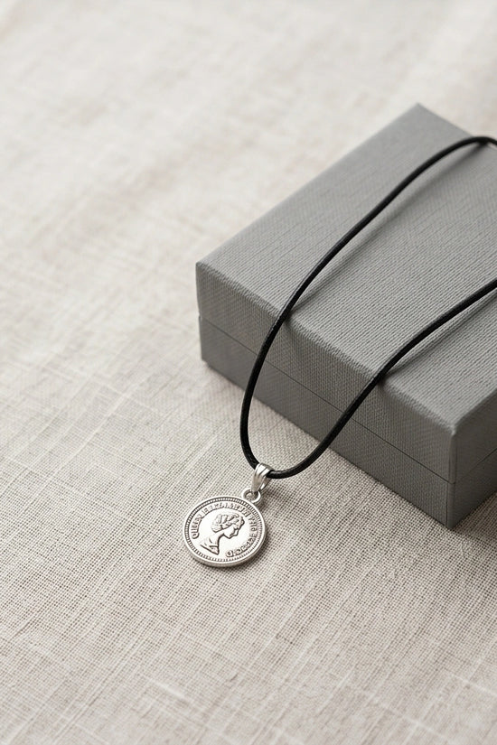 The Royal Heritage: Vintage Elizabeth II Coin Pendant Necklace