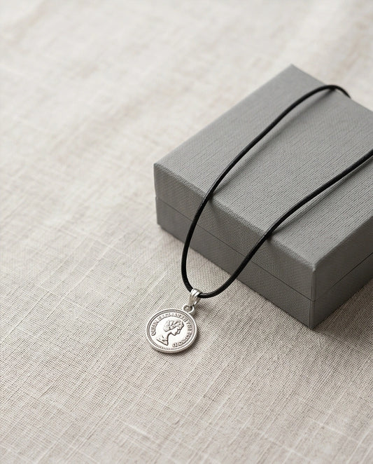 The Royal Heritage: Vintage Elizabeth II Coin Pendant Necklace