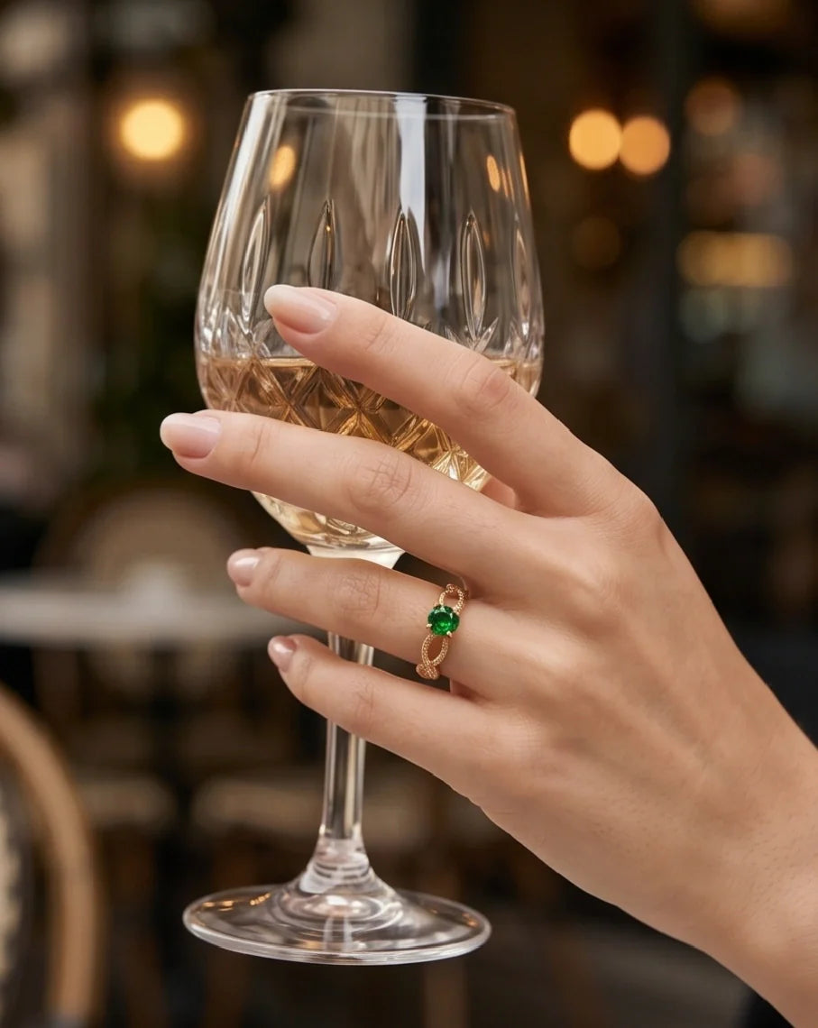 Gold Emerald Round Infinity Twist Ring