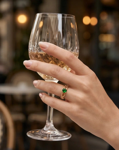 Gold Emerald Round Infinity Twist Ring