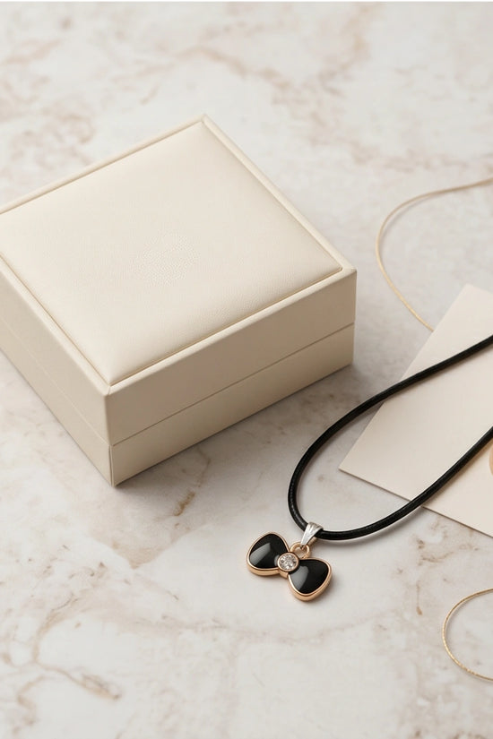 Gold Crystal and Black Bow Necklace