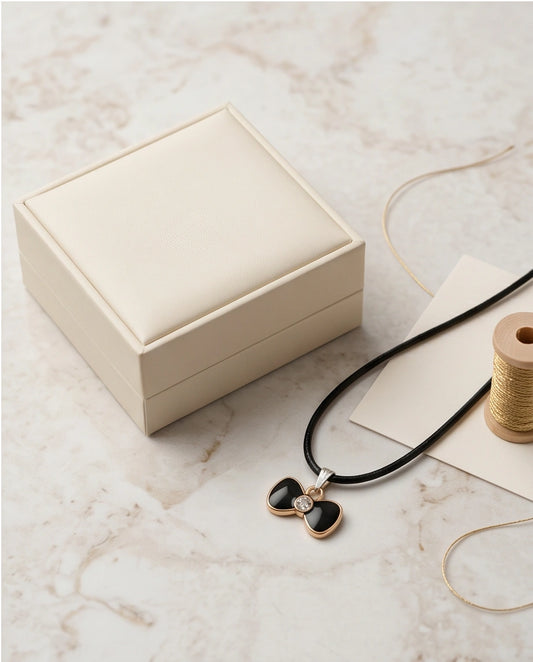 Gold Crystal and Black Bow Necklace