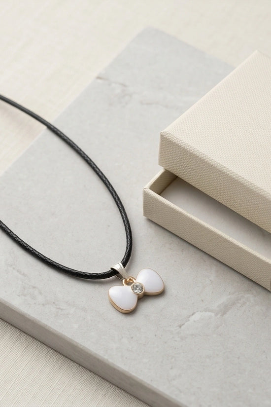 Gold and White Bow Tie Pendant Necklace