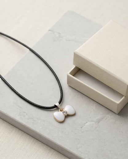 Gold and White Bow Tie Pendant Necklace