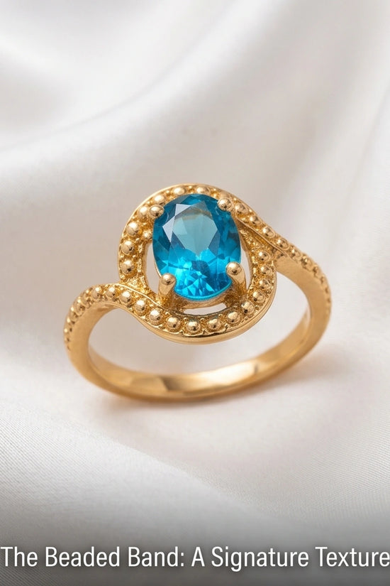 Luxury 14K Gold Oval Swiss Blue Topaz Swirl Halo Ring
