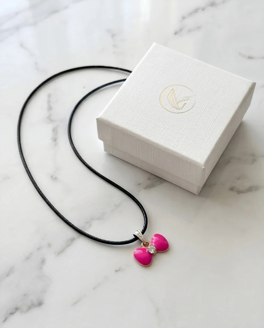 Gold and Pink Crystal Bow Necklace