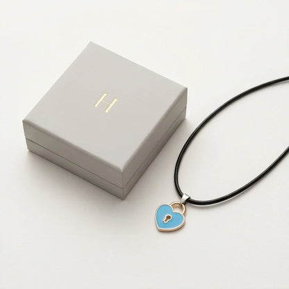 Gold and Pastel Blue Heart Lock Necklace