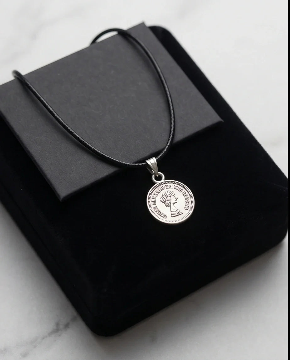 The Royal Heritage: Vintage Elizabeth II Coin Pendant Necklace
