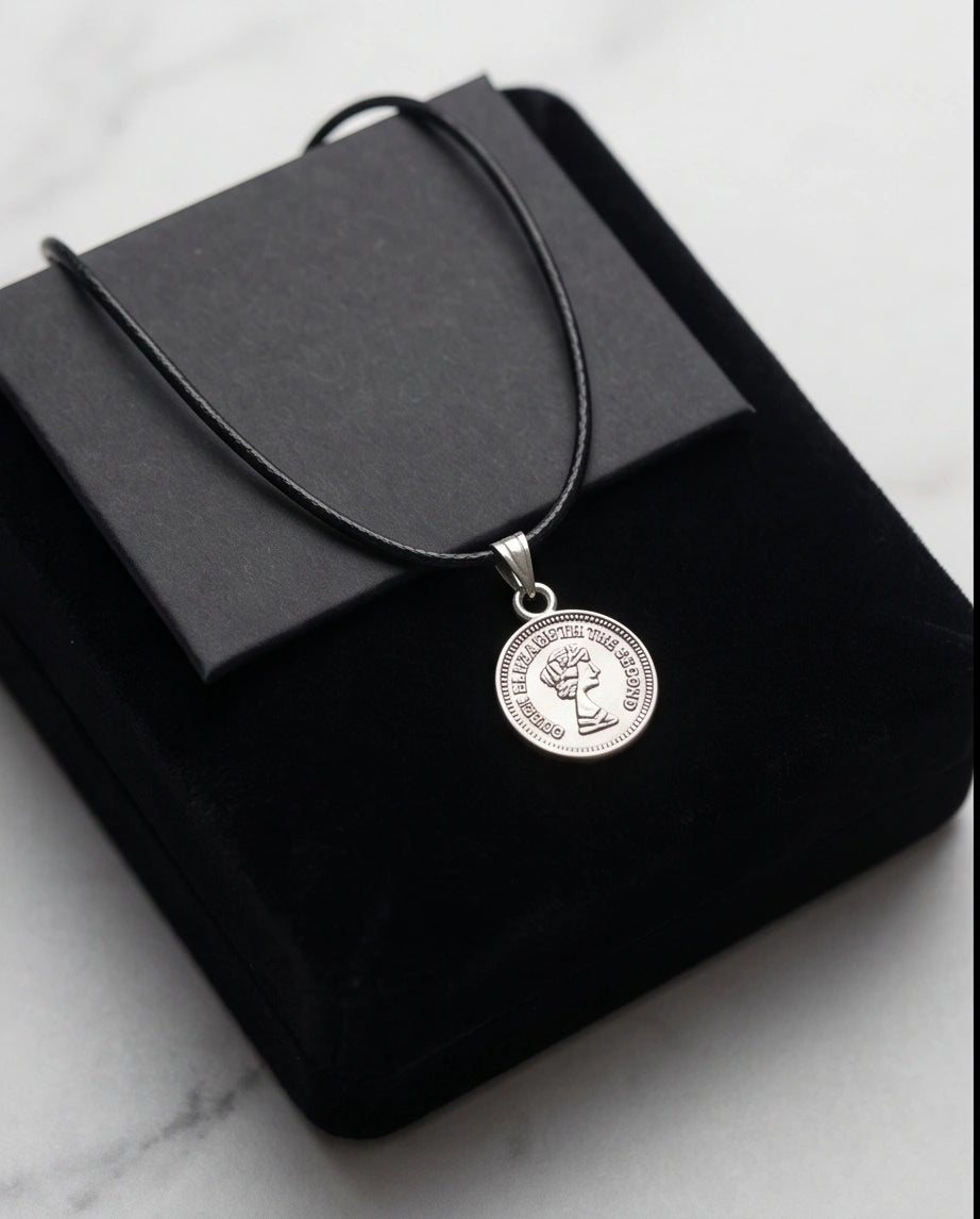 The Royal Heritage: Vintage Elizabeth II Coin Pendant Necklace