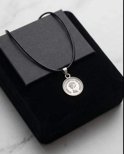 The Royal Heritage: Vintage Elizabeth II Coin Pendant Necklace