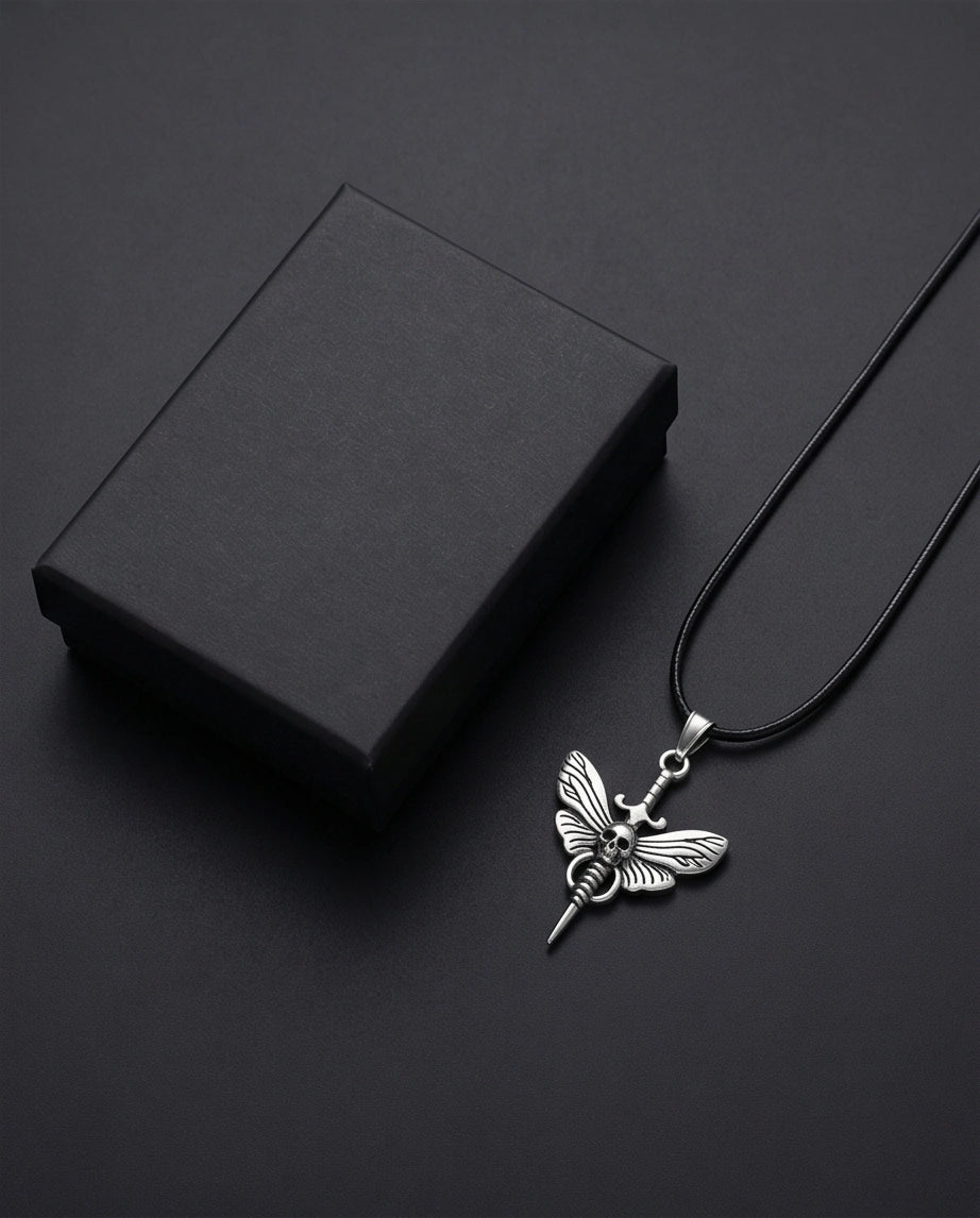 The Shadow Wing: Gothic Skull Moth Dagger Pendant Necklace