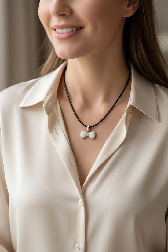 Gold and White Bow Tie Pendant Necklace