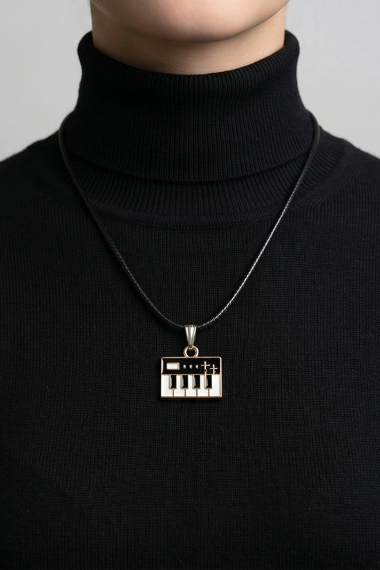 Gold and Black Synthesizer Keyboard Necklace