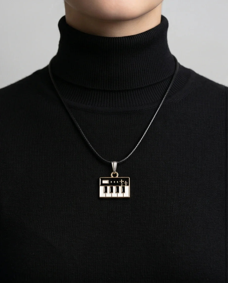 Gold and Black Synthesizer Keyboard Necklace