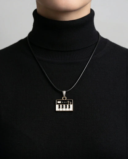 Gold and Black Synthesizer Keyboard Necklace