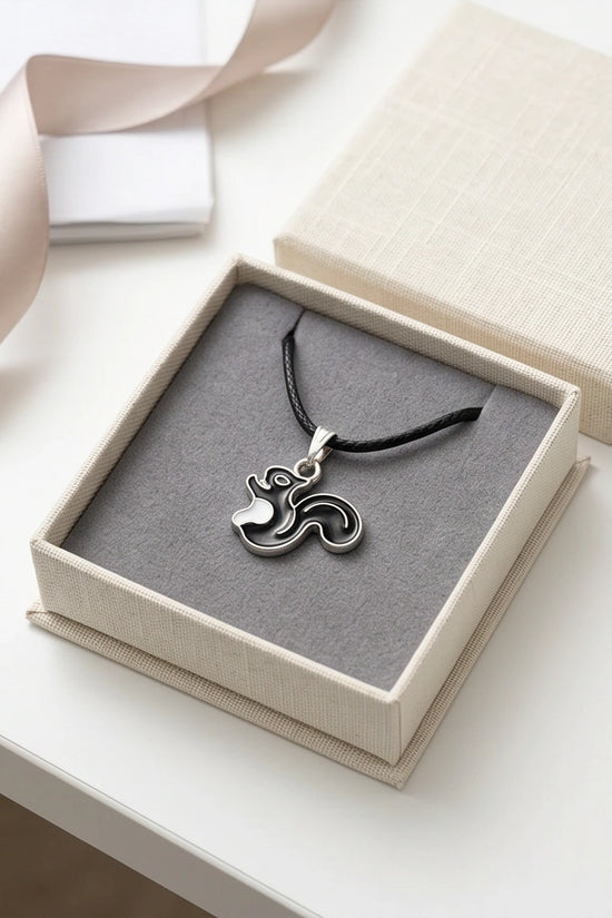 The Midnight Squirrel Pendant