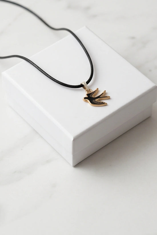 Gold and Black Soaring Swallow Necklace