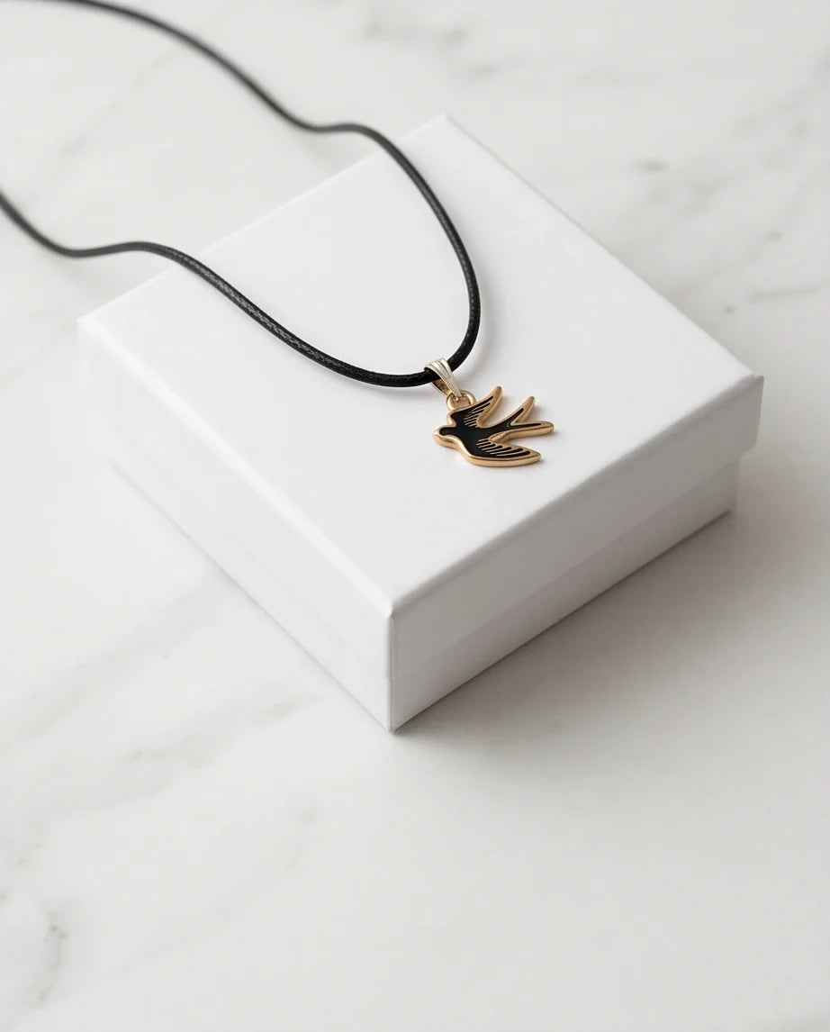 Gold and Black Soaring Swallow Necklace