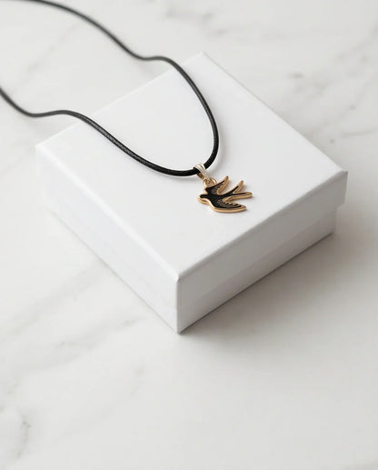 Gold and Black Soaring Swallow Necklace
