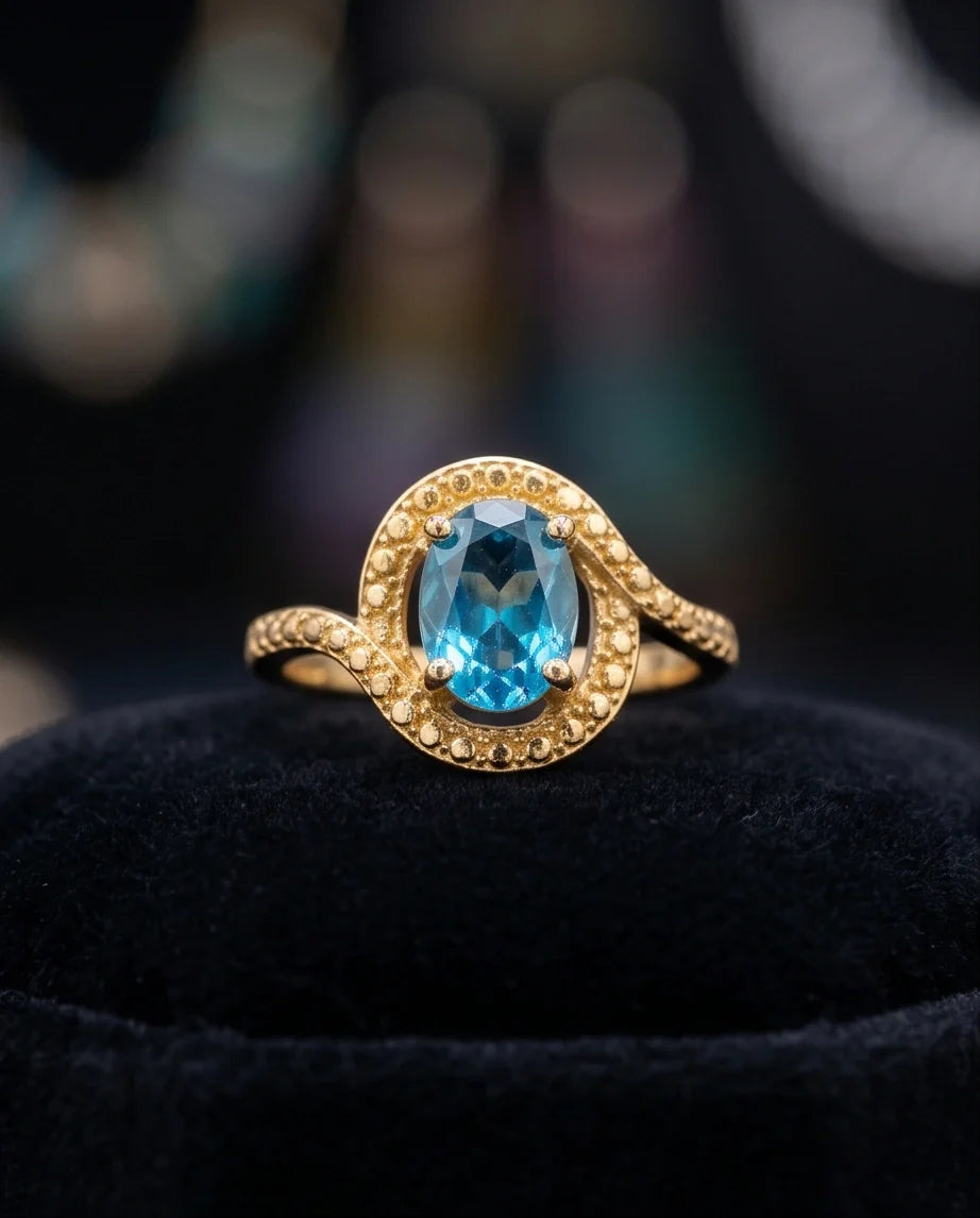 Luxury Gold Oval Swiss Blue Topaz Swirl Halo Ring