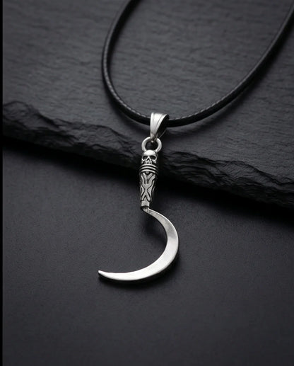 The Reaper's Crescent: Gothic Skull Sickle Pendant Necklace
