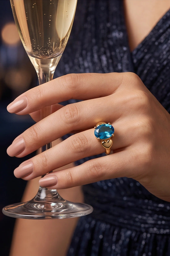 Gold Plated Sky Blue Topaz Oval Heart Accent Ring