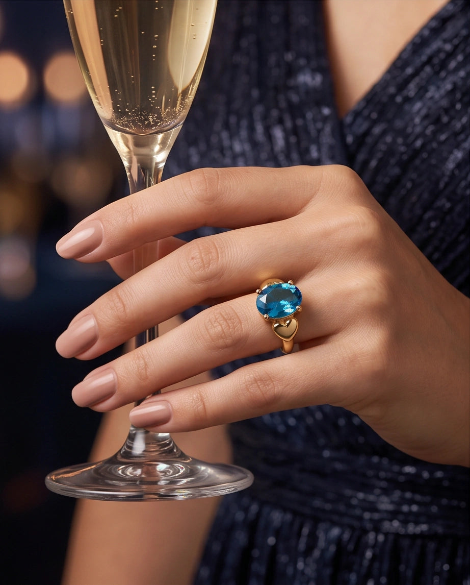 Gold Plated Sky Blue Topaz Oval Heart Accent Ring