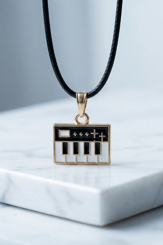 Gold and Black Synthesizer Keyboard Necklace