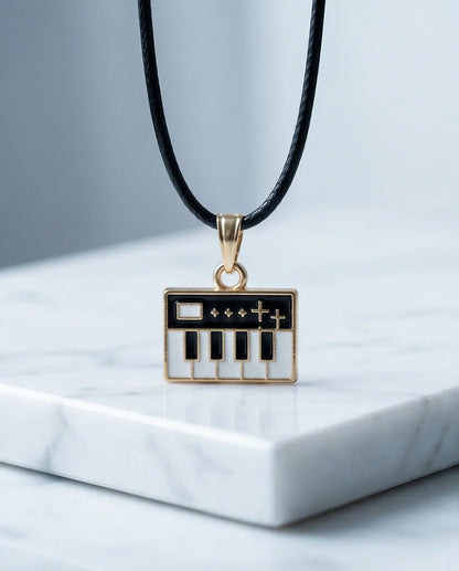 Gold and Black Synthesizer Keyboard Necklace